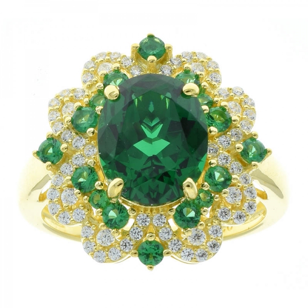 Ring aus 925er Sterlingsilber mit vergoldetem Blumenring und grünem Nano 