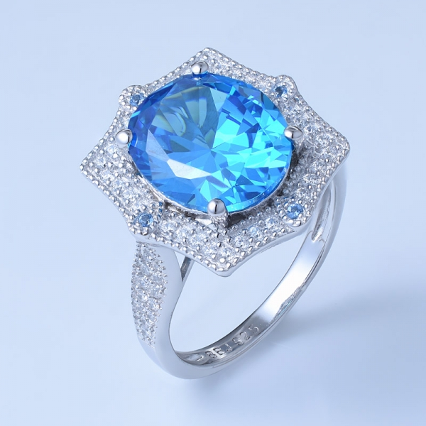 4 ct ovales neonblaues Apatit-Rhodium über einem Verlobungsring im Sterling-Design 