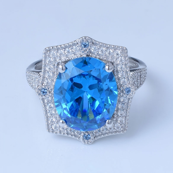 4 ct ovales neonblaues Apatit-Rhodium über einem Verlobungsring im Sterling-Design 