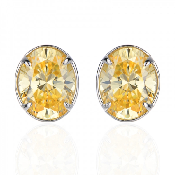 Ohrring aus 925er Silber mit ovalem gelben Diamanten und rundem weißen Zirkonia 